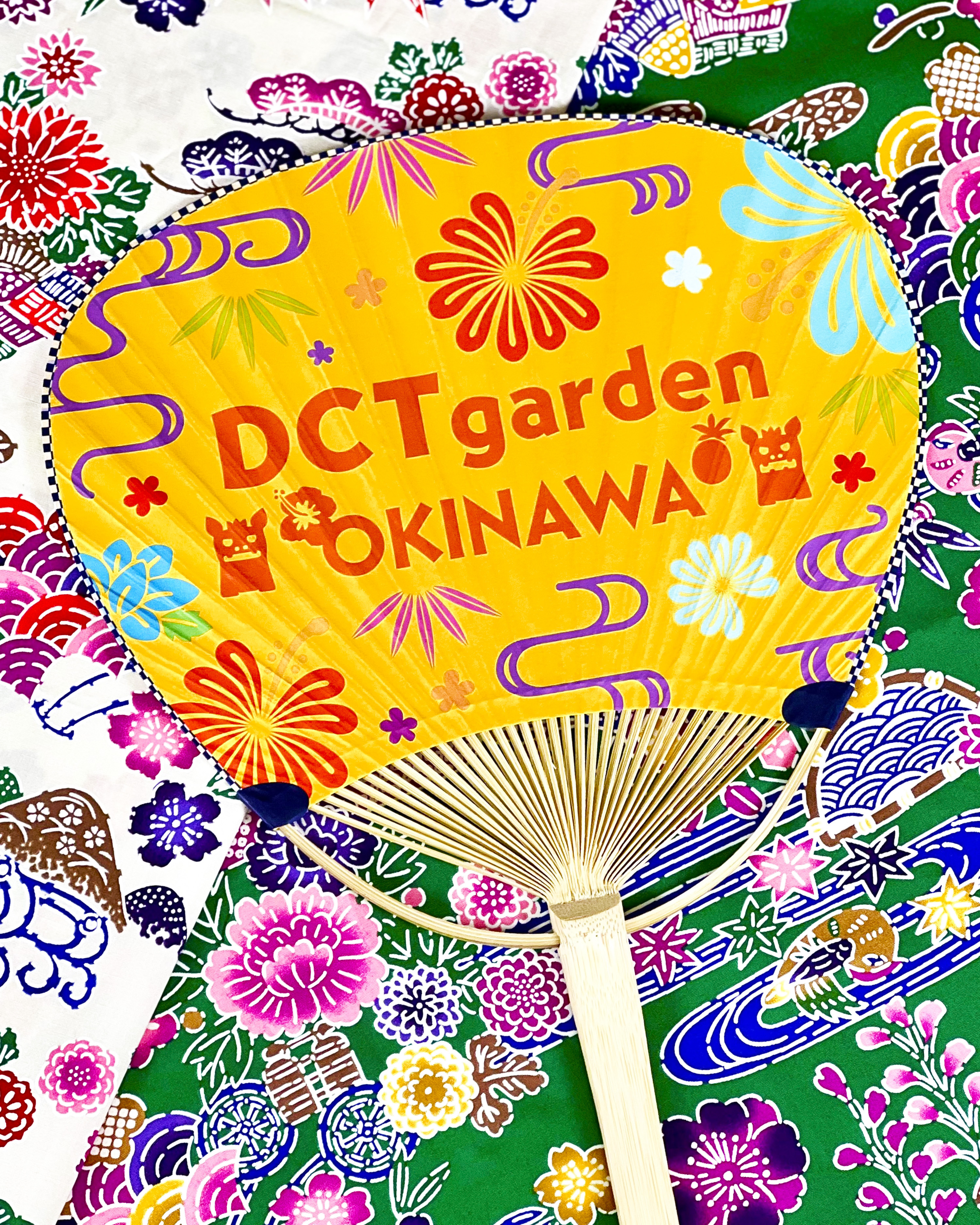 DCTgarden OKINAWA うちわ（黄色）